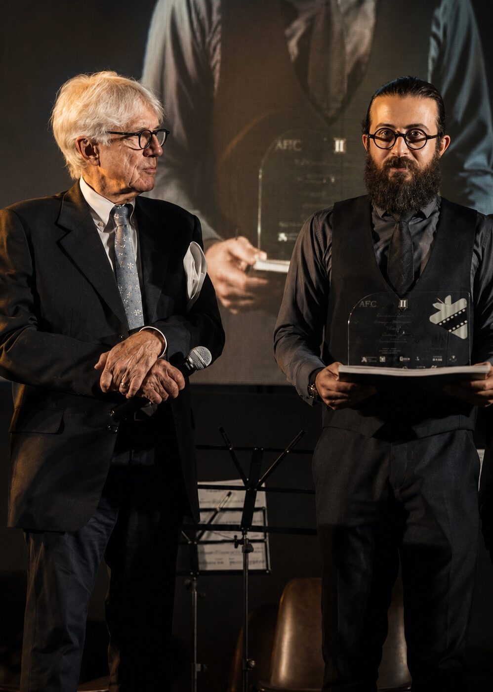 Giacomo Battiato and Milad Mansouri accepting the Best Film — Jury's Choice award at AmiCorti International Film Festival, June 2022